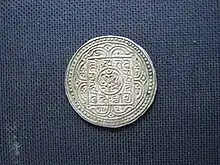 Image 24Tibetan silver tangka with Ranjana (Lantsa) script, dated 15-28 (= AD 1894), obverse (from Tibetan tangka)