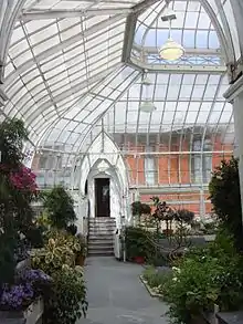 Conservatory viewed from entrance from Victoria Hall showing door leading to the WPL