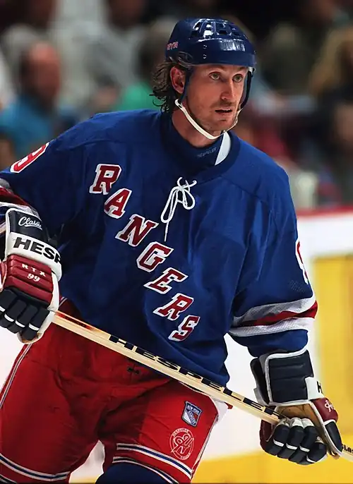 Image 6Wayne GretzkyPhoto credit: Håkan DahlströmIce hockey player Wayne Gretzky, as a member of the New York Rangers of the National Hockey League (NHL) in 1997. Gretzky, nicknamed "The Great One", is widely considered the best hockey player of all time. Upon his retirement in 1999, he held forty regular-season records, fifteen playoff records, and six All-Star records. He is the only NHL player to total over 200&nbsp;points in one season—a feat he accomplished four times. In addition, he tallied over 100&nbsp;points in 15 NHL seasons, 13 of them consecutively. He is the only player to have his number (99) officially retired by the NHL for all teams.More selected portraits